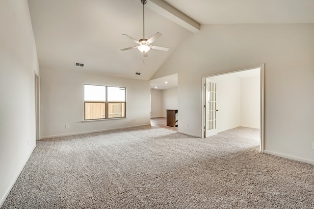 unfurnished living room with beamed ceiling, ceiling fan, light carpet, and high vaulted ceiling