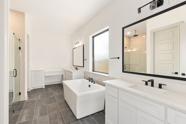 bathroom featuring tile patterned flooring, plus walk in shower, and vanity