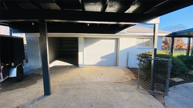 view of patio / terrace featuring a garage