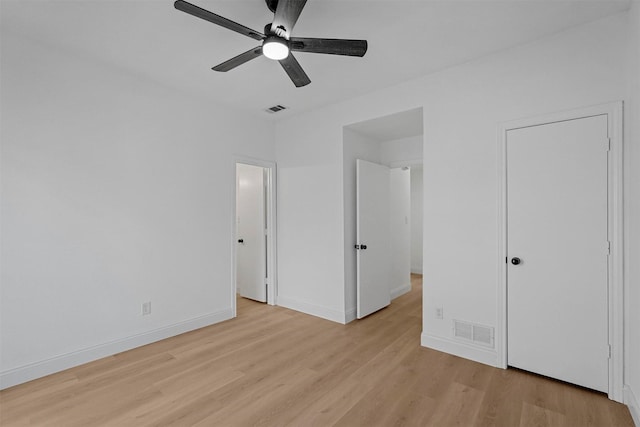 unfurnished bedroom featuring ceiling fan and light hardwood / wood-style flooring