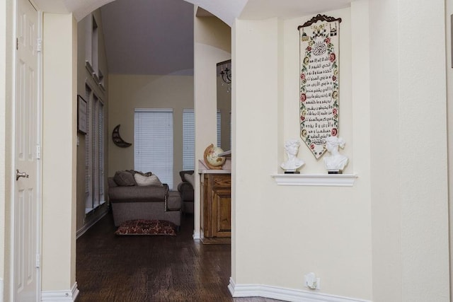 corridor featuring dark hardwood / wood-style flooring