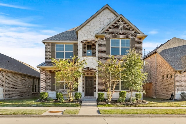 2053 Barx Dr, Little Elm, TX 75068 - view of front facade featuring brick siding, stone siding, and a shingled roof