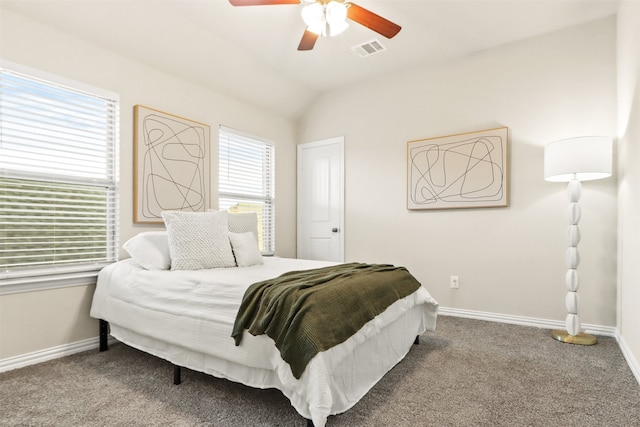 carpeted bedroom featuring ceiling fan and lofted ceiling