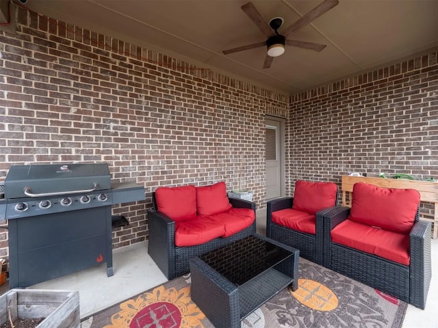 view of patio / terrace with an outdoor living space, ceiling fan, and a grill