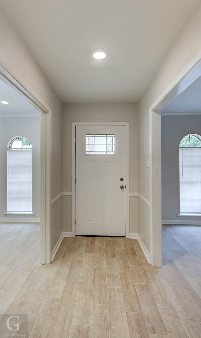 doorway to outside featuring light wood-type flooring