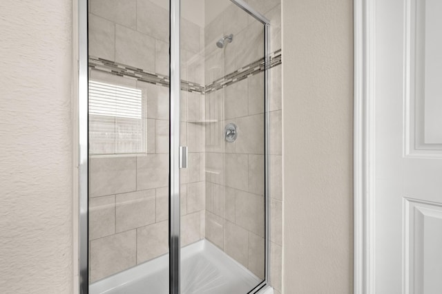 bathroom with an enclosed shower