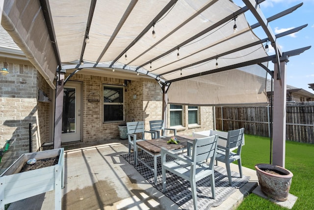 view of patio featuring a pergola