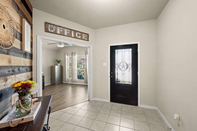 entryway with ceiling fan and light hardwood / wood-style floors