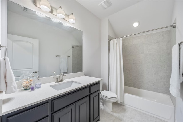 full bathroom featuring shower / bath combination with curtain, tile patterned floors, vanity, and toilet