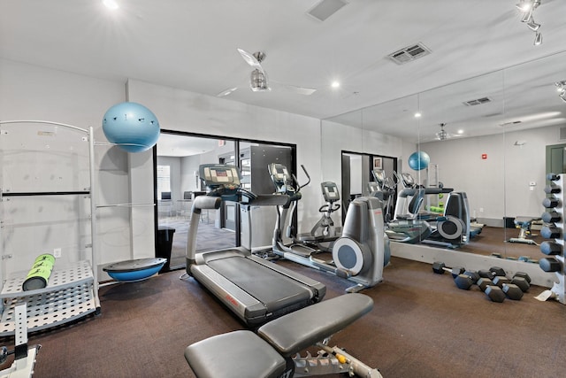 exercise room with ceiling fan