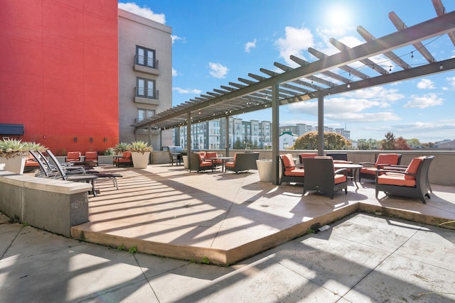 view of patio / terrace with a pergola and an outdoor hangout area