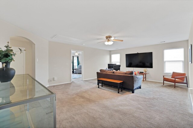 spare room featuring carpet flooring and ceiling fan