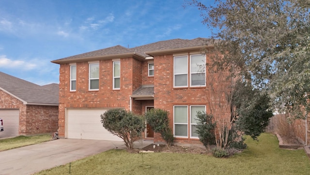 view of front of home featuring brick siding, roof with shingles, concrete driveway, a front yard, and a garage