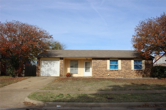 single story home with a front lawn and a garage