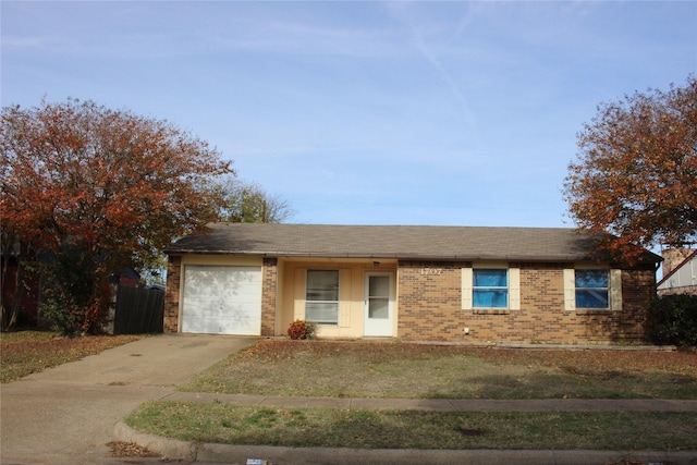 single story home with a garage