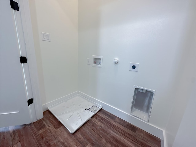 laundry room with washer hookup, hookup for an electric dryer, hookup for a gas dryer, and wood-type flooring