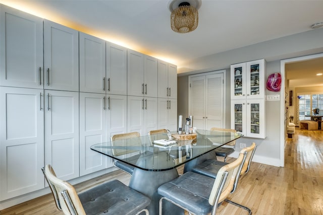 dining room with light wood-type flooring