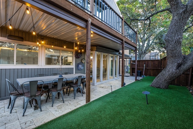 view of patio with a balcony