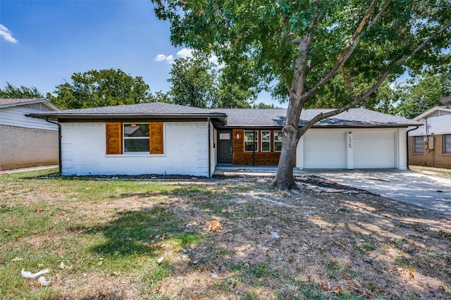 ranch-style house featuring a garage