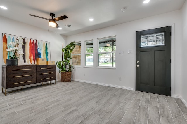 entrance foyer featuring ceiling fan and light hardwood / wood-style flooring