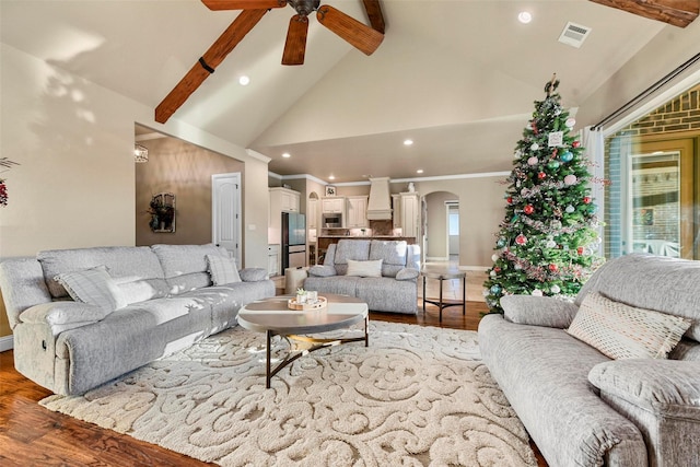 living room with ceiling fan, beamed ceiling, light hardwood / wood-style floors, and high vaulted ceiling