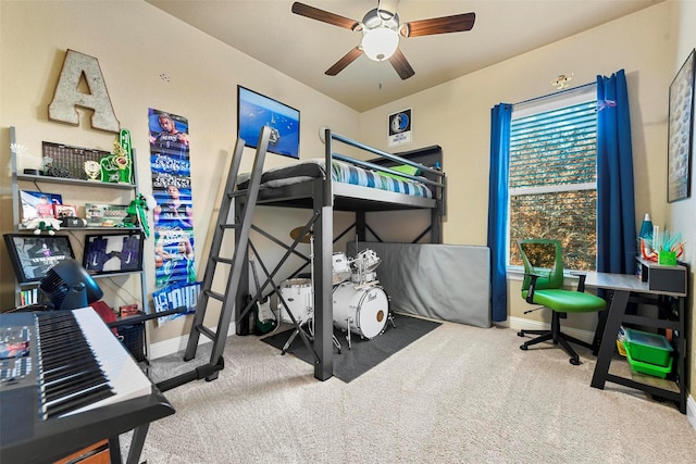 carpeted bedroom with ceiling fan