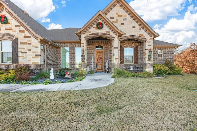 view of front of home with a front yard