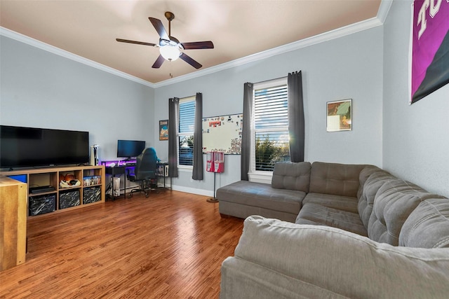 living room with crown molding, hardwood / wood-style floors, and ceiling fan