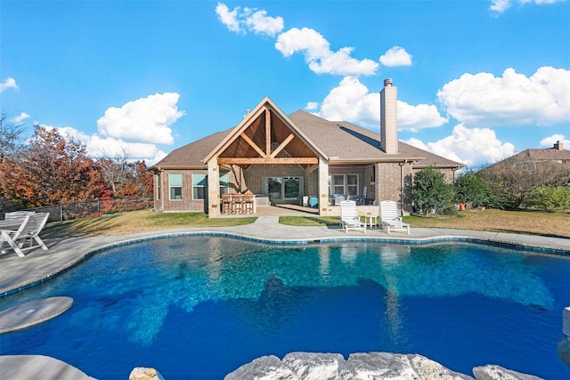 view of pool featuring a patio