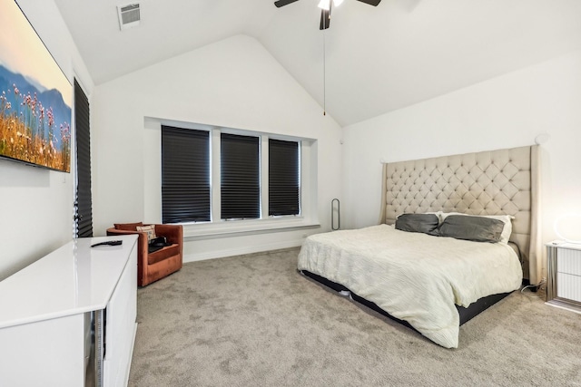 carpeted bedroom featuring lofted ceiling and ceiling fan