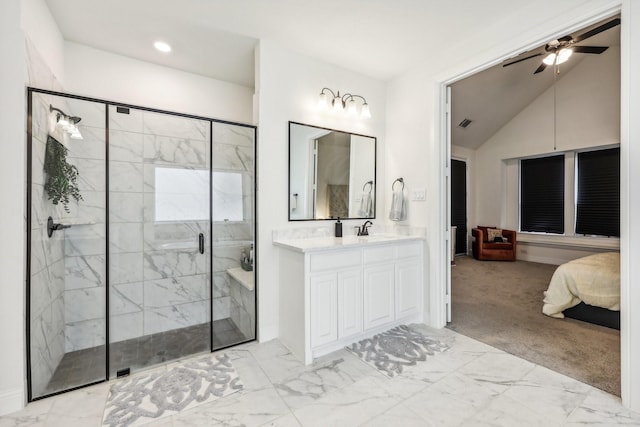 bathroom featuring vanity, vaulted ceiling, ceiling fan, and walk in shower