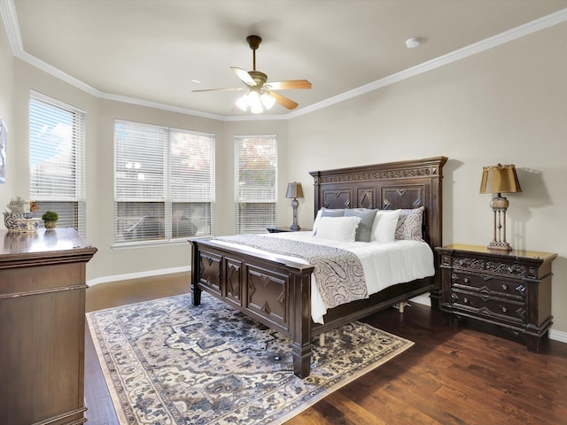 bedroom with dark hardwood / wood-style flooring, crown molding, multiple windows, and ceiling fan