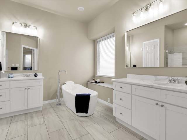 bathroom featuring vanity and a shower