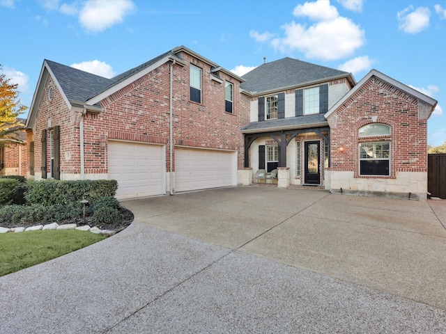 view of front of property with a garage