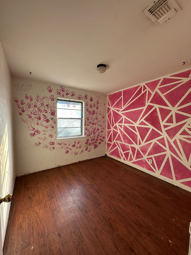 unfurnished room featuring hardwood / wood-style floors