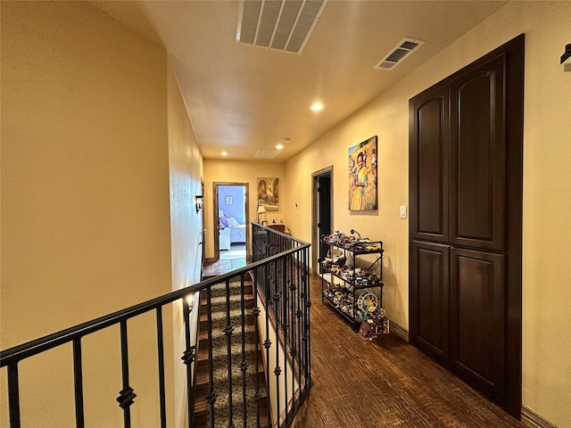 hallway featuring dark hardwood / wood-style flooring