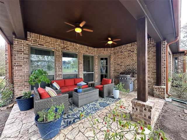 view of patio / terrace featuring an outdoor living space, ceiling fan, and a grill