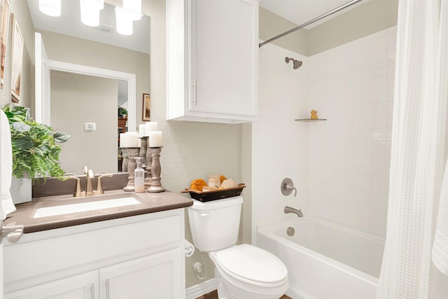 full bathroom with vanity, shower / bathtub combination with curtain, and toilet