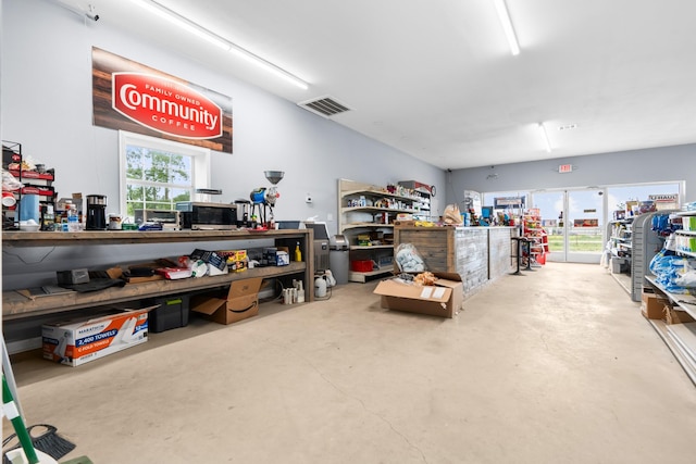 misc room featuring concrete floors and a wealth of natural light