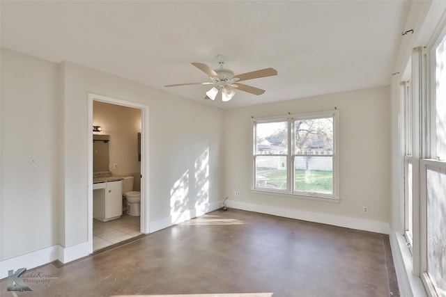 unfurnished room featuring ceiling fan