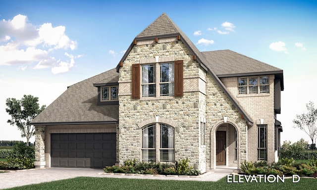 view of front of home with a garage