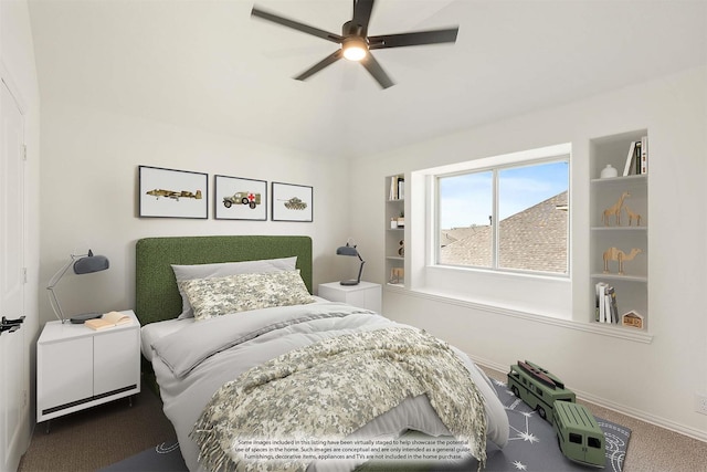 carpeted bedroom featuring baseboards and ceiling fan
