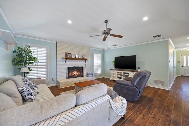 109 Crestwood Dr, Rockwall, TX 75087 - living area featuring ornamental molding, dark wood finished floors, ceiling fan, a fireplace, and recessed lighting