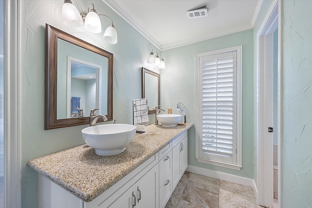 bathroom with vanity, ornamental molding, and an inviting chandelier