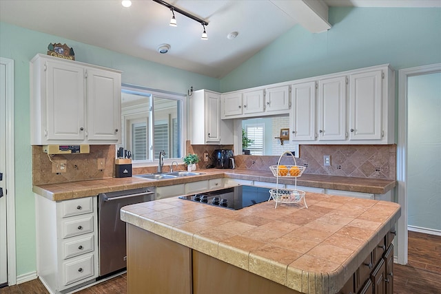 kitchen with a center island and white cabinetry