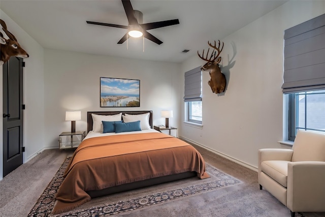 carpeted bedroom with ceiling fan