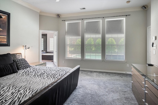 bedroom with carpet flooring, connected bathroom, and crown molding