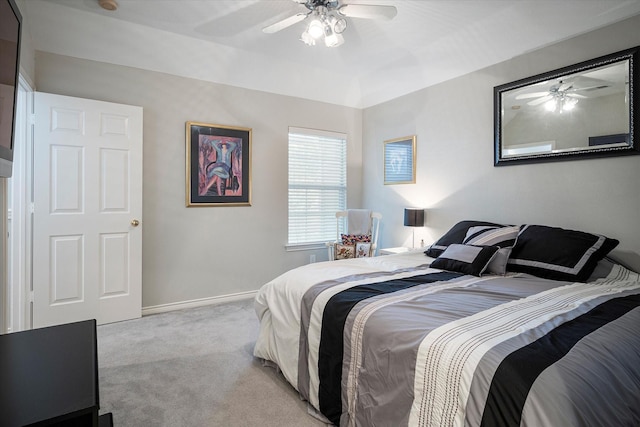 bedroom featuring ceiling fan and light colored carpet