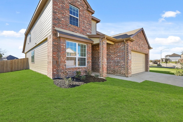 view of front facade featuring a garage and a front lawn