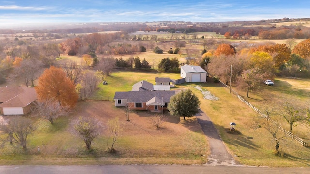 birds eye view of property featuring a rural view